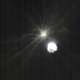 LICIACube image showing the aftermath of the DART impact. The object at top is Dimorphos, while the object in the foreground is Didymos.